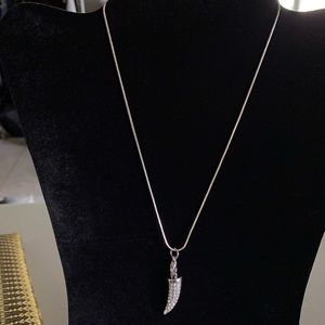 Wolf tooth silver pendant with crystals